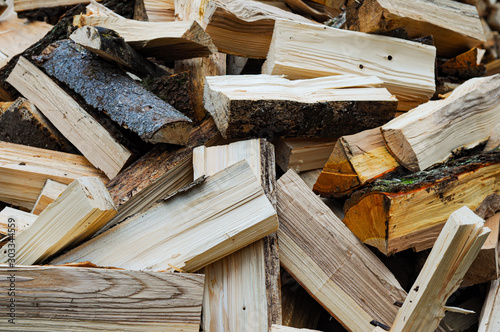 Photographie pile of wooden logs, preparing for winter