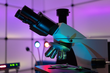 Wall Mural -  laboratory microscope in bokeh light