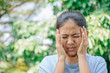 © anut21ng Stock - Young Woman Suffering From Painful Feeling headache , Healthcare Concept