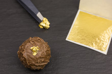 Edible Gold Leaf Transfered On A Chocolate Truffle