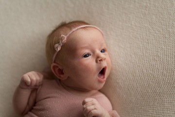 Assleep newborn baby girl portrait