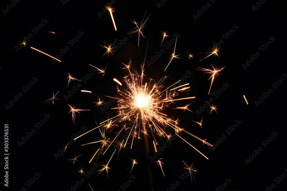 Fire spark xmas with black background. Magic glowing flow of sparks in ...