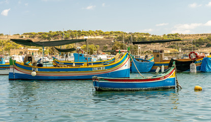 Wall Mural - view of the harbor with boats, of marsaxlokk on malta