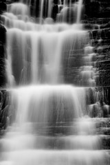 The Alpine waterfall, black and white photography