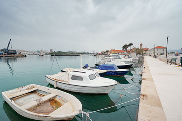 Harbor with leisure and fishing boats at anchor,