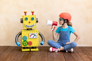 Poster - Happy child with toy robot