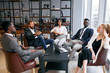 © alfa27 - Confident business partners gathered in office to discuss interesting joined business ideas, share business ideas