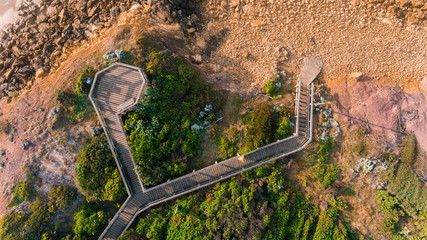 Wall Mural - Aerial View of Waves and Beaches at Sunset Along the Great Ocean Road, Australia