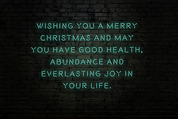 Wall Mural - Neon inscription of christmas and new year greetings on brick wall