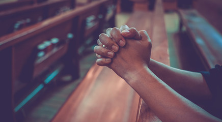 Close up male prayer's hand pray in church, Pastor pray to God, with blank copy space