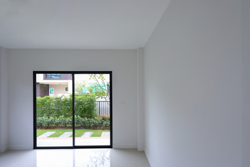 Wall Mural - empty white wall interior room with slide door in new residential house