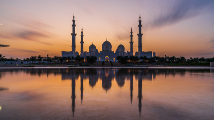 Wall Mural - silhouette of Sheikh zayed grand mosque  in sunset