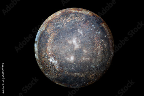 Abstract image of planet Jupiter from the surface of an old griddle on a black background in space.