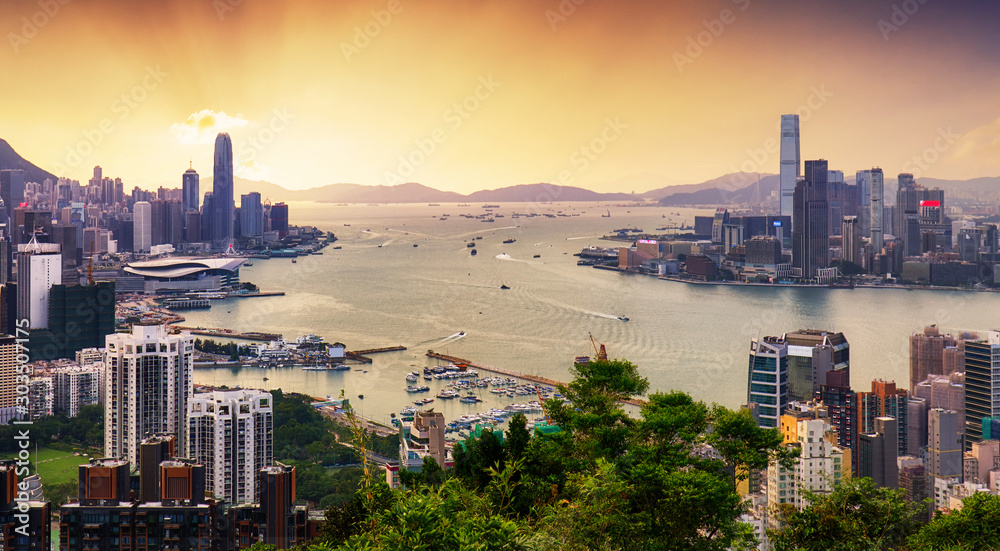 Hong Kong skyline at dramatic sunset - obrazy, fototapety, plakaty 