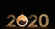 Christmas Toy Is Made From A Fragrant Cup Of Coffee. Christmas Toy. Holiday Concept. Fragrant Coffee On A Red Background For Your Advertising. Smoke From Hot Coffee. The Numbers 2020 Are Written From 