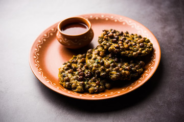 Canvas Print - Chana Dal Bhabra / Babra served with tomato ketchup, popular food from Bihar / Bhojpur of India