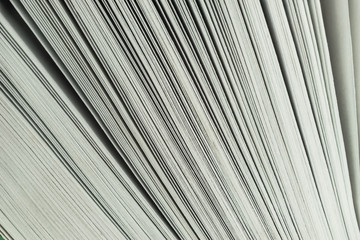 Poster - Close up beautiful white pages book background texture. Macro Photography view.