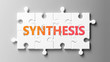 Synthesis complex like a puzzle - pictured as word Synthesis on a puzzle pieces to show that Synthesis can be difficult and needs cooperating pieces that fit together, 3d illustration