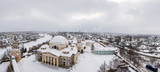 Fototapeta Do pokoju - Panorama of the winter city photographed from a bird's eye view. Heavily snow-covered landscape. Torzhok, Russia.