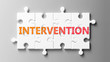 Intervention complex like a puzzle - pictured as word Intervention on a puzzle pieces to show that Intervention can be difficult and needs cooperating pieces that fit together, 3d illustration