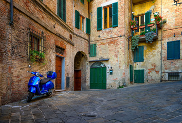 Wall Mural - Medieval narrow street in Siena, Tuscany, Italy