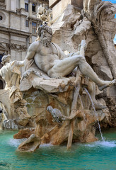 Wall Mural - Fountain of the Four Rivers (Fontana dei Quattro Fiumi) with an Egyptian obelisk on Piazza Navona, Rome, Italy. Architecture and landmark of Rome. Postcard of Rome.