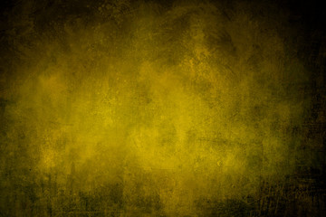 dark grungy yellow background or texture