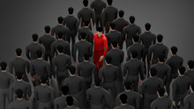 One Human Standing Out From The Crowd. The Red Man Walking Through The Crowd In Different Way. Concept For Challenge,  Business, Organization, Boss, Way, Choice And Direction. Copy Space. 3d Rendering