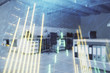 © Andrey - Stock market chart with trading desk bank office interior on background. Double exposure. Concept of financial analysis