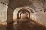 Fototapeta Desenie - Underground tunnel with lights and flat floor