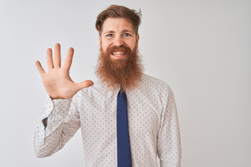 Poster - Young redhead irish businessman standing over isolated white background showing and pointing up with fingers number five while smiling confident and happy.