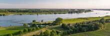 Panoramic Shot Of A Dutch Landscape With The River Waal Near The Village Of Herwijnen