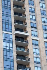 Balconies and windows on side of building 