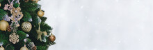 Holidays Banner With Decorated Christmas Tree Branches On Snowy Background. New Year Backdrop With Copy Space. 