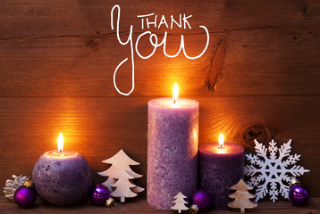 Wall Mural - English Calligraphy Thank You. Purple Romantic Candle Light With Christmas Decoration. Brown Wooden Background