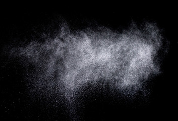 Wall Mural - Texture of a snowstorm isolated on a black background, Clusters of stars in space, dynamic scattering of particles