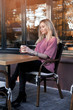 © MagicsPhotos - Beautiful woman drinks cappiccino at sunset outdoors.