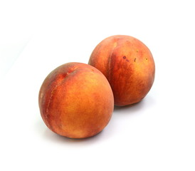 Wall Mural - Ripe peach fruits isolated on white background.