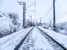 A Section Of Railway Covered With Snow On A Winter Day.