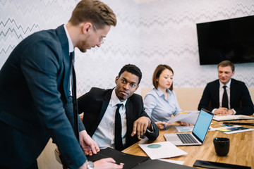 Poster - Coworkers meeting in conference room