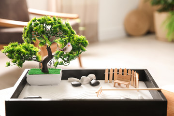 Wall Mural - Beautiful miniature zen garden on wooden table indoors