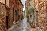 Fototapeta Na drzwi - Volterra medieval town Picturesque  houses Alley in Tuscany Italy