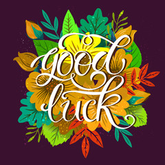  Good Luck Lettering poster with bright colorful flowers, leaves and branch. Can be used for T shirt, web page background, textile typography design elements and so on