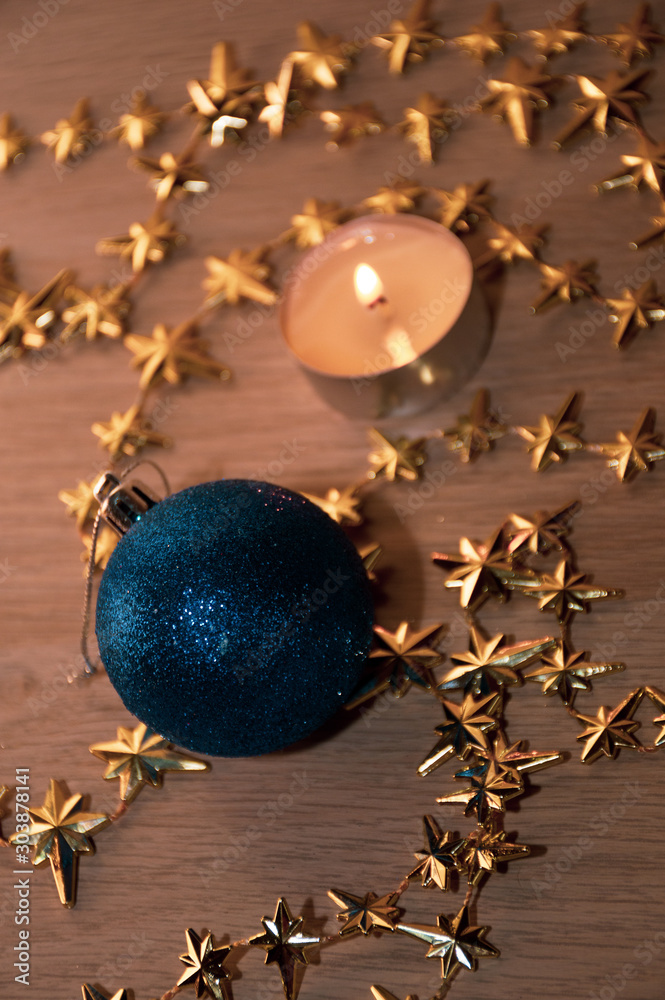 christmas still life with candle and decorations - obrazy, fototapety, plakaty 