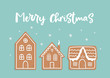 Vector doodle Christmas card with gingerbread houses on blue background