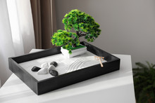 Beautiful Miniature Zen Garden On White Table Indoors
