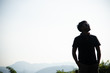 © Arthiti - determined man, explorer pathfinder forest, military man forest, man with tactical gear at the cliff with mountain view, cool guy forest.