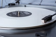 © Николай Крапивин - Turntable with white vinyl record. Hi-fi music lover concept