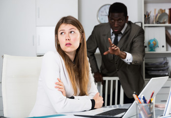  Upset woman with angry boss