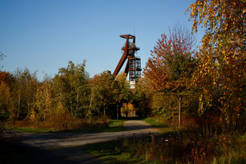  mining tower behind autumn trees